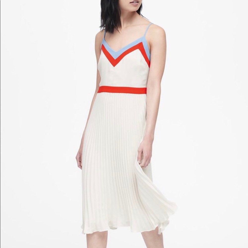 White pleated color bock midi dress.